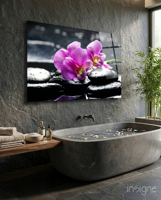 Spa pink orchid glass wall art displayed above a console in a designer interior