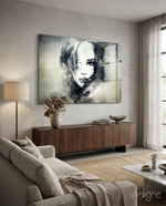Woman Portrait glass wall art displayed above a console in a designer interior