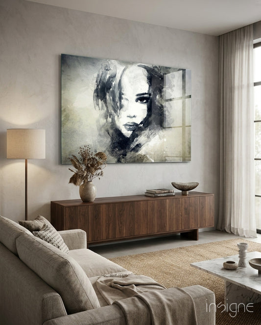 Woman Portrait glass wall art displayed above a console in a designer interior