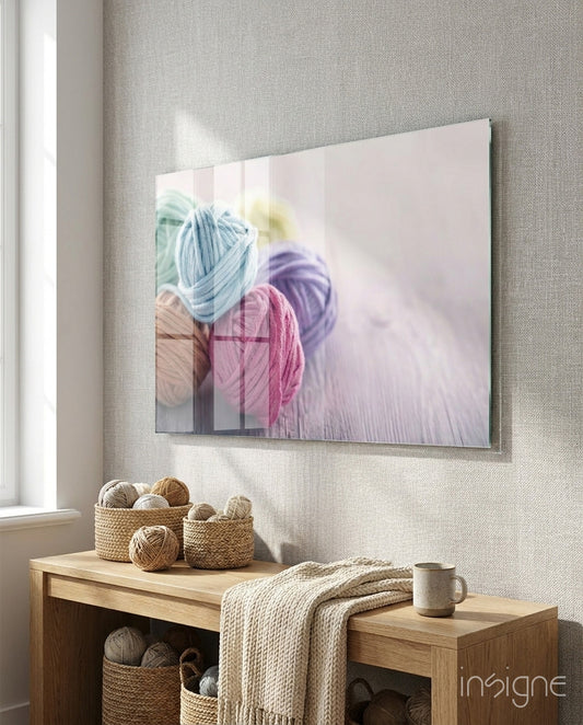 Balls of Rope glass wall art displayed above a console in a designer interior