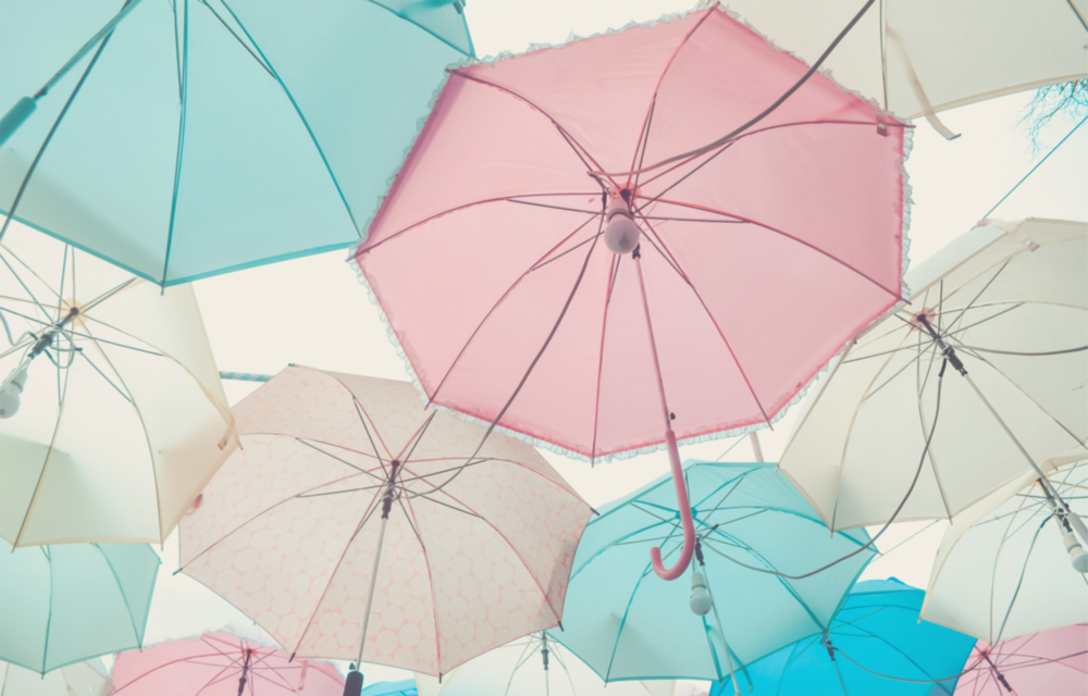 Umbrellas Glass Wall Art