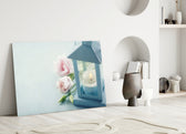 Candle and Rose glass wall art styled above a bed in a feminine bedroom