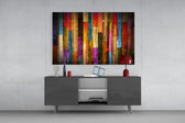 Fine art abstract – vertical wood planks painted in vivid multicolor stripes of red, blue, orange, purple, teal and yellow with visible wood grain