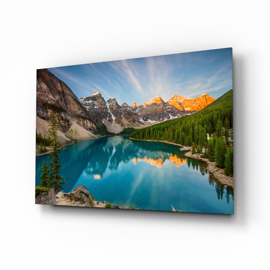 Lake Moraine glass wall art displayed above a console in a designer interior