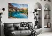 Lake glass wall art styled above a sofa in a travel-inspired living room