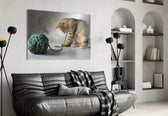 Cat glass wall art styled above a bed in a child's bedroom