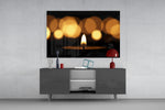 Candle panel catching warm light to reveal its bokeh glow