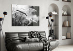 Flower glass wall art styled above a bed in a soft-romance bedroom