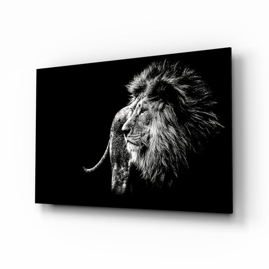 Lion glass wall art displayed above a console in a designer interior