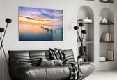 Sunset glass wall art styled above a bed in a poetic bedroom