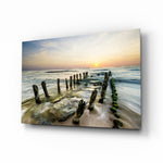 Dock weathered groynes glass wall art displayed above a console in a designer interior