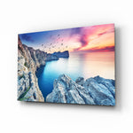 Red Sunset cliffs glass wall art displayed above a console in a designer interior