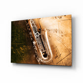 Saxophone glass wall art displayed above a console in a designer interior