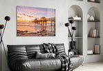 Dock glass wall art styled above a sofa in a seaside-retreat living room