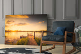 Dock glass print enhancing a cabin-inspired dining area