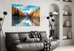 Lake glass wall art styled above a sofa in a cabin-mood living room