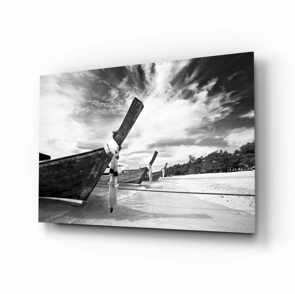 Boats on the Beach glass wall art displayed above a console in a designer interior
