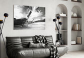 Boats on the Beach glass wall art styled above a sofa in a global-adventure living room