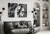 Black-White Flower glass wall art styled above a bed in a graphic-mood bedroom