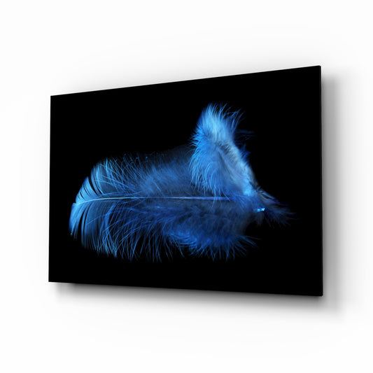 Blue Feather glass wall art displayed above a console in a designer interior
