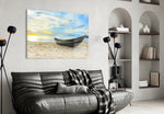 Beach glass wall art styled above a bed in a seaside-mood bedroom