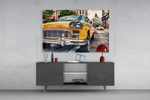Classic Taxi panel catching warm light to reveal its glossy yellow paint