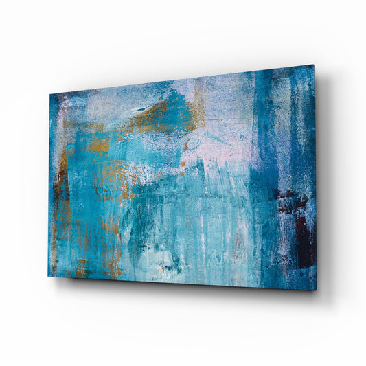 Blue glass wall art displayed above a console in a designer interior