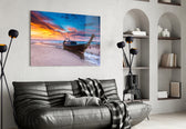 Red Sky glass wall art styled above a sofa in a global-adventure living room