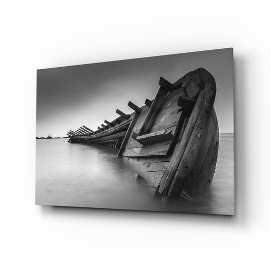 Shipwreck glass wall art displayed above a console in a designer interior