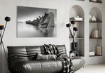 Shipwreck glass wall art styled above a desk in a contemplative study