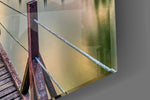 Dock artwork anchoring a library with lakeside palette