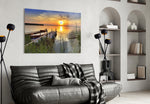 Sunset glass wall art styled above a bed in a retreat-mood bedroom