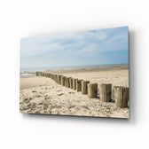Beach glass wall art displayed above a console in a designer interior