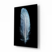 Blue Feather glass wall art displayed above a console in a designer interior