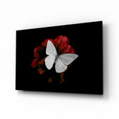 Butterfly glass wall art displayed above a console in a designer interior
