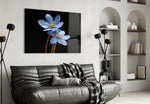 Blue Flower glass wall art styled above a bed in a serene bedroom
