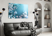 Spring Flowers glass wall art styled above a bed in a serene bedroom
