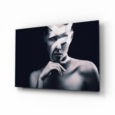 Woman Portrait 9 glass wall art displayed above a console in a designer interior