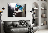 Female Portrait 10 glass wall art styled above a bed in an editorial bedroom