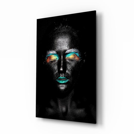 Woman glass wall art displayed above a console in a designer interior