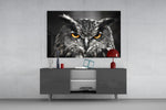 Owl artwork anchoring a study with selective-color palette