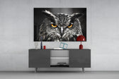 Owl artwork anchoring a study with selective-color palette
