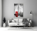 Close-up detail of the red phone box against black-and-white Big Ben