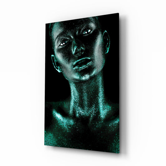Woman glass wall art displayed above a console in a designer interior