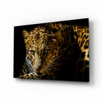 Leopar glass wall art displayed above a console in a designer interior