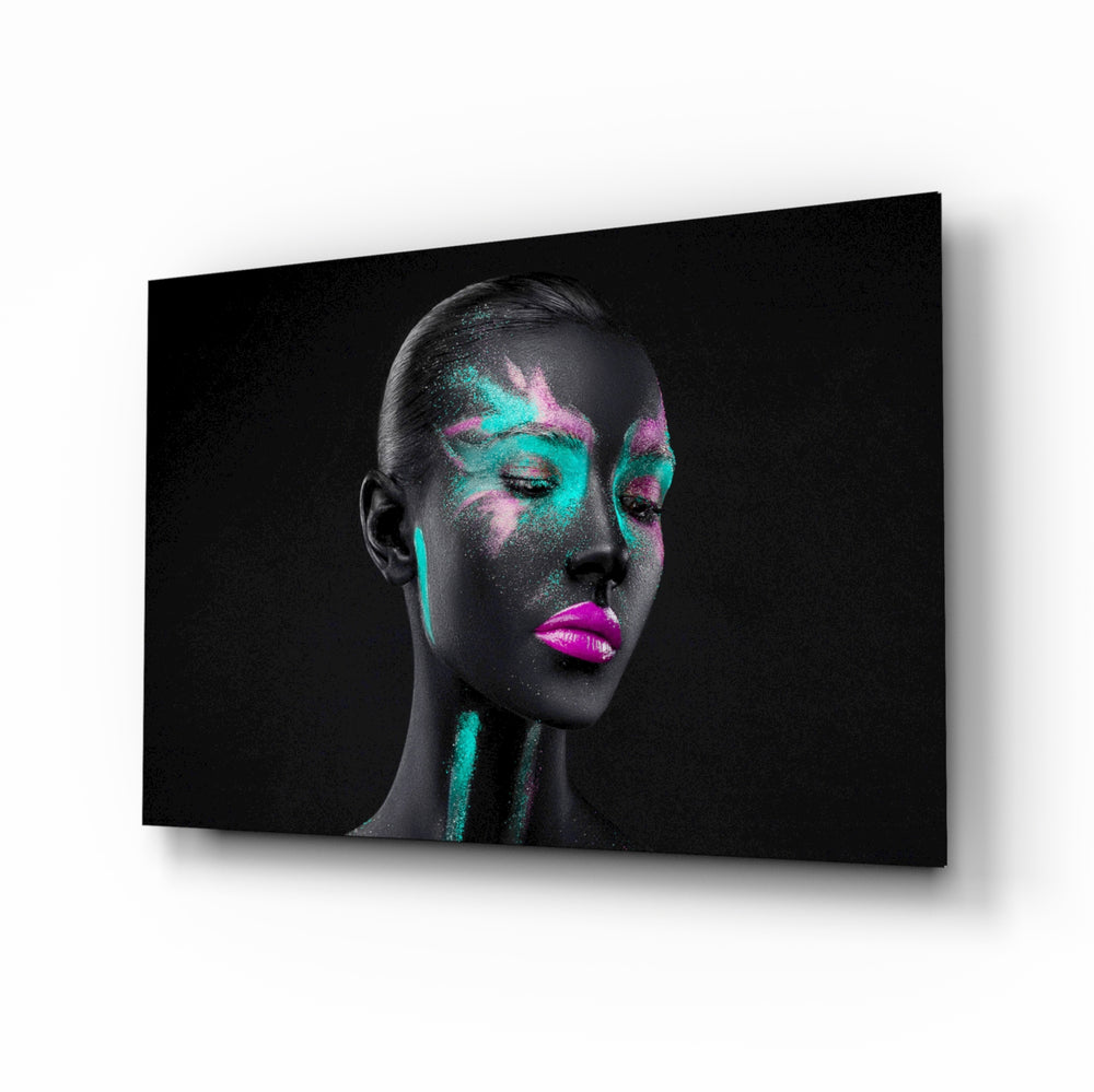 Woman glass wall art displayed above a console in a designer interior