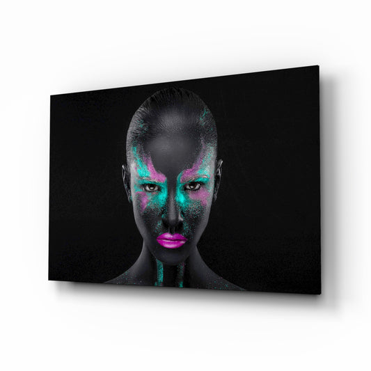 Woman glass wall art displayed above a console in a designer interior