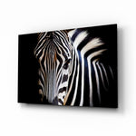 Zebra glass wall art displayed above a console in a designer interior