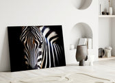 Close-up detail of the zebra's flowing stripes and dark eye
