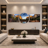 A panoramic mountain valley with golden-lit granite cliffs, a winding river, and a dense pine forest under a dramatic blue sky. 3 piece glass wall art set B